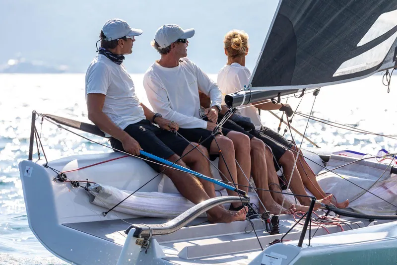 Slide: The Image of Sailors racing on a 2016 Melges 20 sailboat in sunny weather. - 9