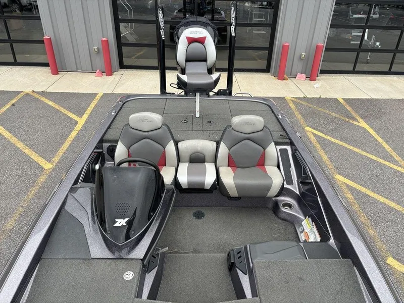 Slide: The Image of 2017 Skeeter ZX250 boat interior with dual seats and steering console. - 15