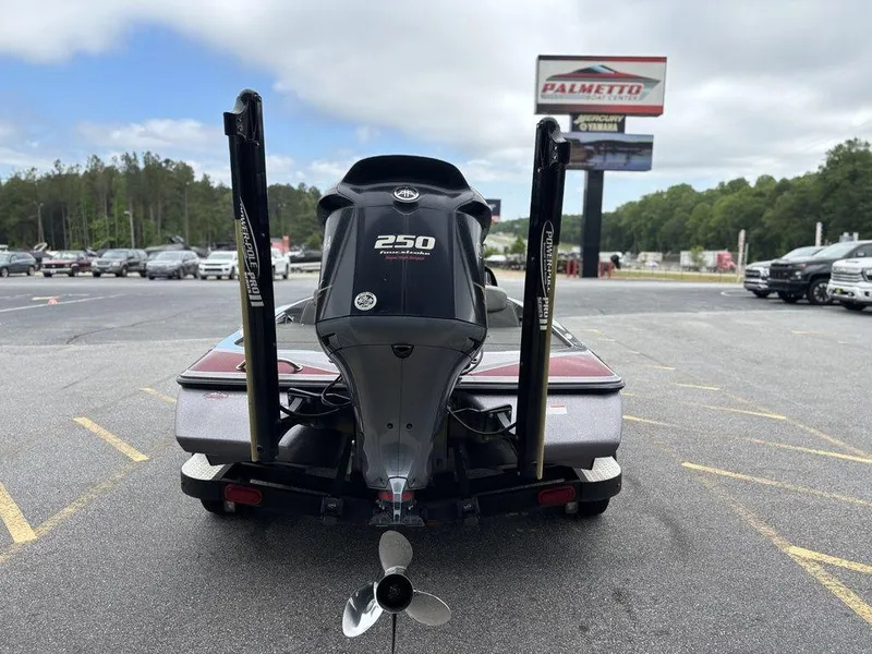 Slide: The Image of 2017 Skeeter ZX250 boat with powerful 250 engine, parked outdoors. - 5