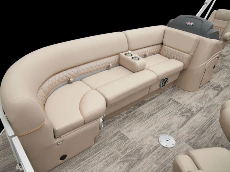 Slide: The Image of Luxurious seating on 2024 Ranger 220FC boat with beige upholstery and wood-style flooring. - 12