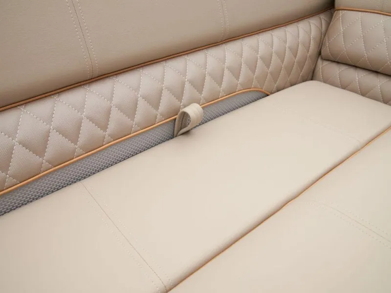 Slide: The Image of Luxurious beige leather seating with diamond stitching in 2024 Ranger 220FC boat. - 14