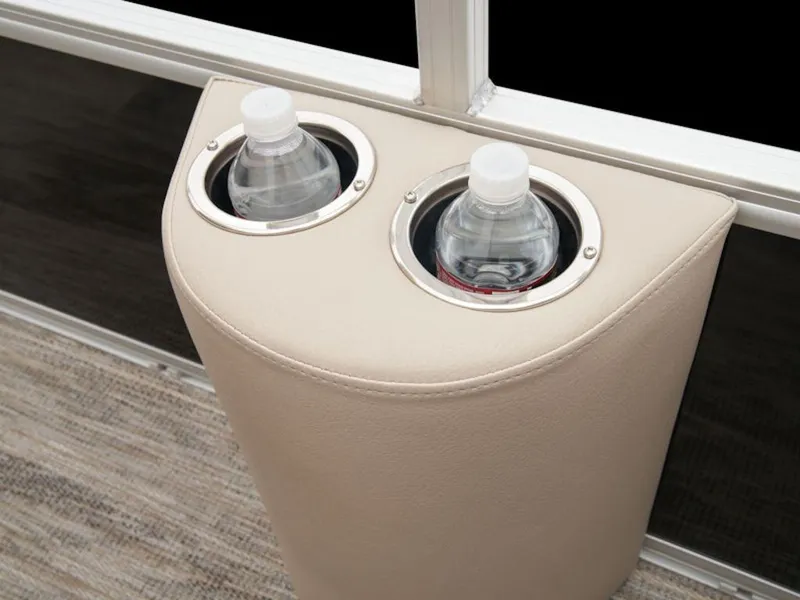 Slide: The Image of Cup holders with water bottles in 2024 Ranger 220FC boat interior. - 17