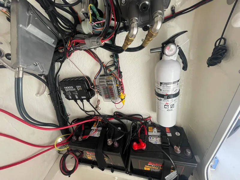 Slide: The Image of Electrical system and fire extinguisher in 2024 Key West 203 FS boat. - 9
