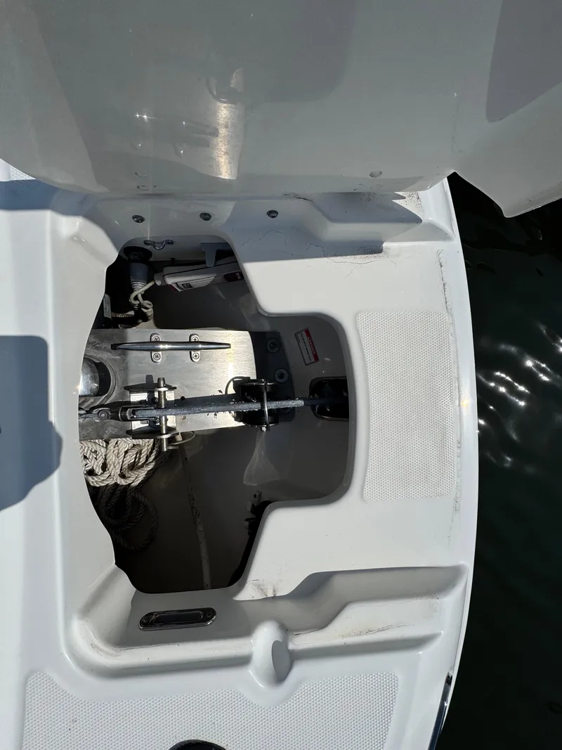 Slide: The Image of 2018 Boston Whaler 270 Vantage boat anchor compartment, open and detailed view. - 12