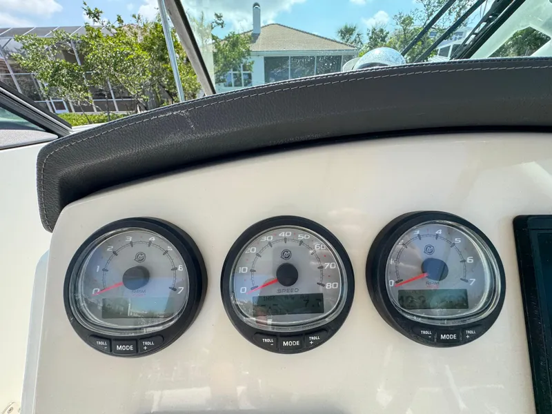 Slide: The Image of Dashboard gauges of a 2018 Boston Whaler 270 Vantage boat. - 18
