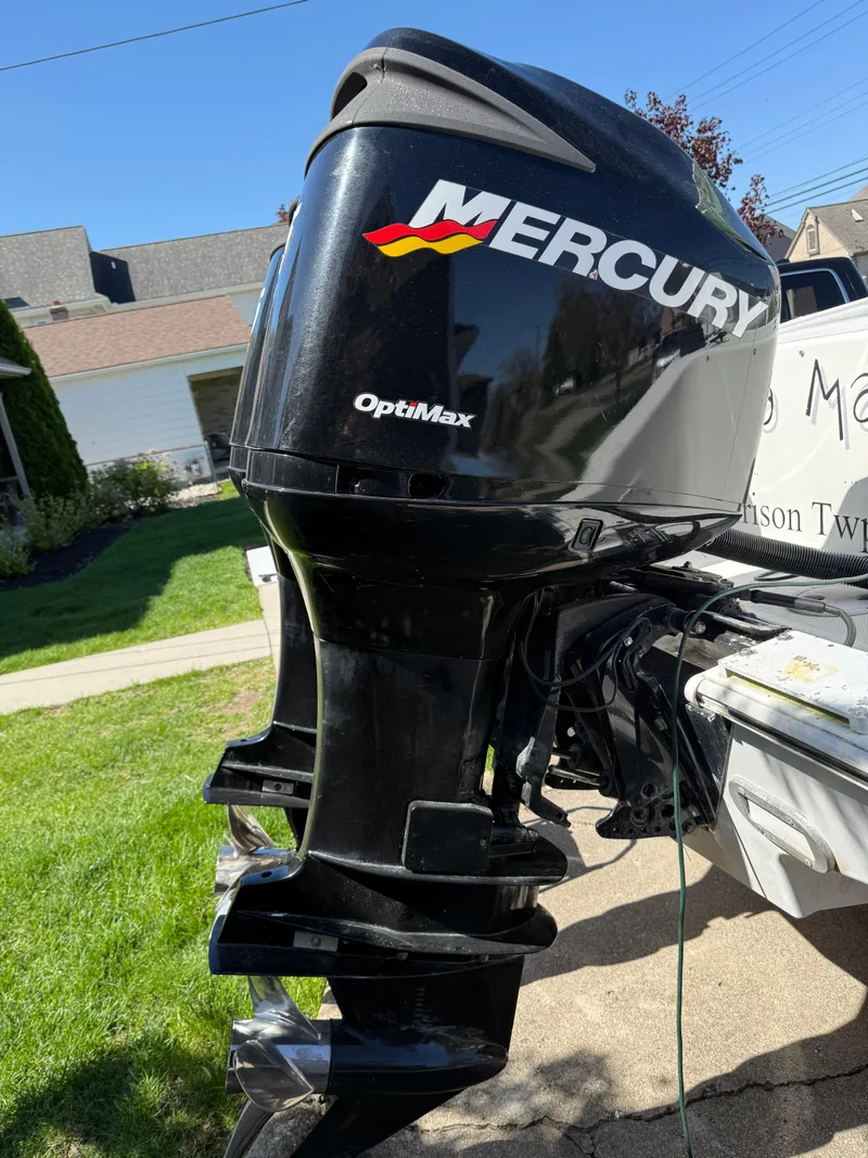 Slide: The Image of 1994 Fountain 31 Tournament Edition with Mercury OptiMax outboard motor. - 11