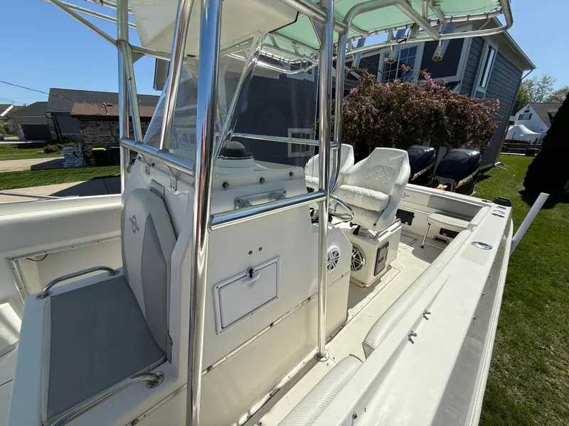 Slide: The Image of 1994 Fountain 31 Tournament Edition boat with center console and seating, parked outdoors. - 27