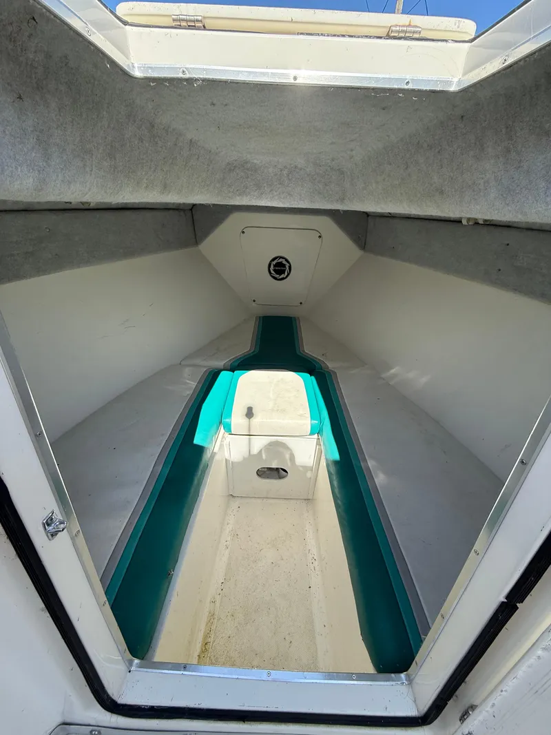 Slide: The Image of Interior view of a 1994 Fountain 31 Tournament Edition boat cabin. - 28