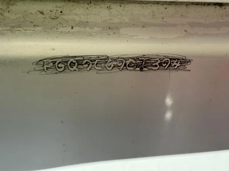 Slide: The Image of 1994 Fountain 31 Tournament Edition boat hull identification number. - 35