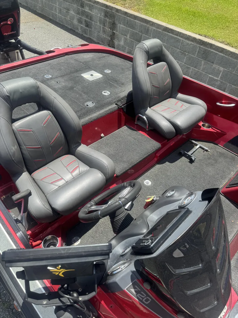 Slide: The Image of 2016 Nitro Z20 boat interior with dual seats and steering console. - 4