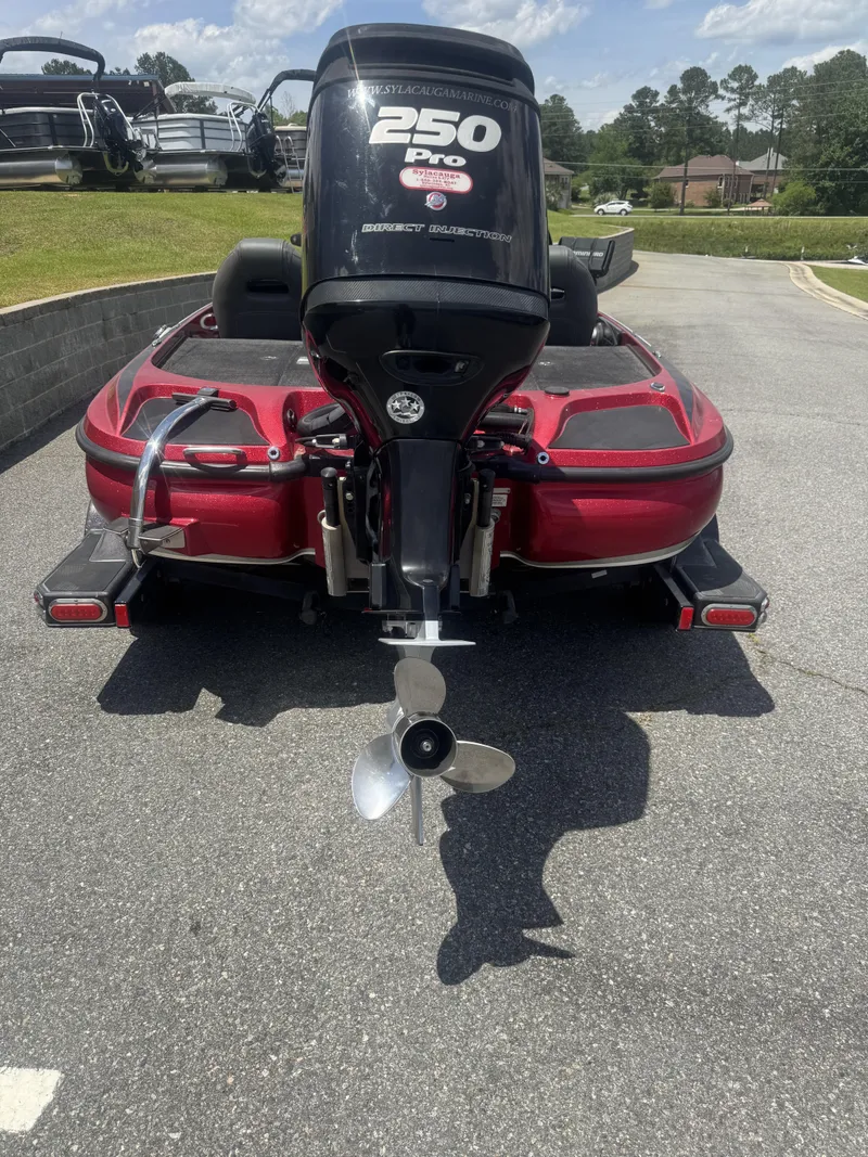 Slide: The Image of Rear view of a red 2016 Nitro Z20 boat with a 250 Pro motor. - 9