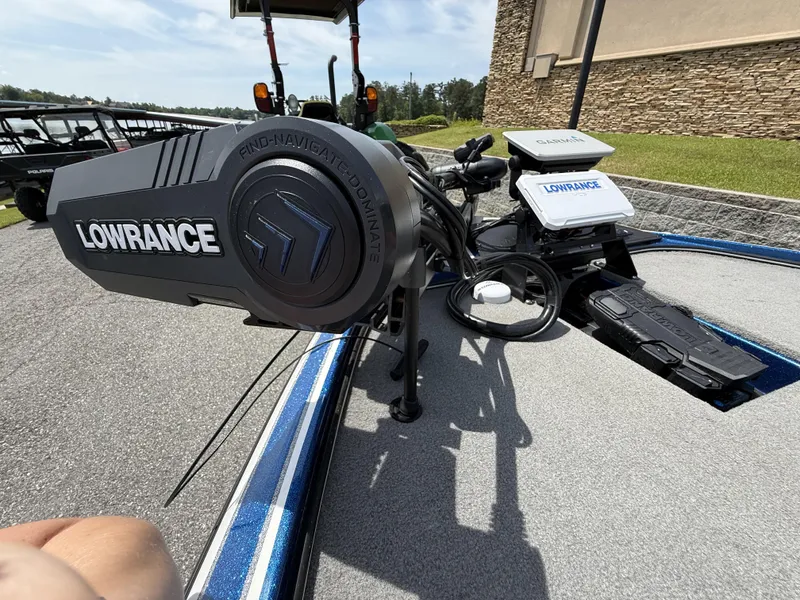 Slide: The Image of Nitro Z20 Pro 2022 boat with Lowrance equipment on deck, parked outdoors. - 15