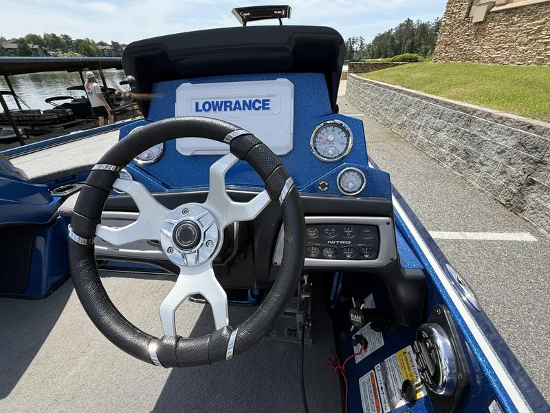 Slide: The Image of Steering wheel and dashboard of a 2022 Nitro Z20 Pro boat with Lowrance display. - 20