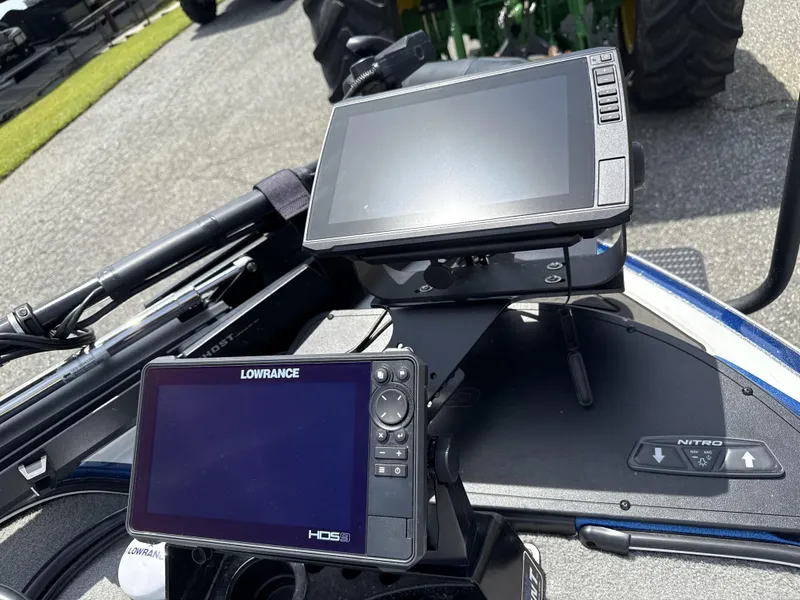 Slide: The Image of Dual fish finders on a 2022 Nitro Z20 Pro boat dashboard. - 3