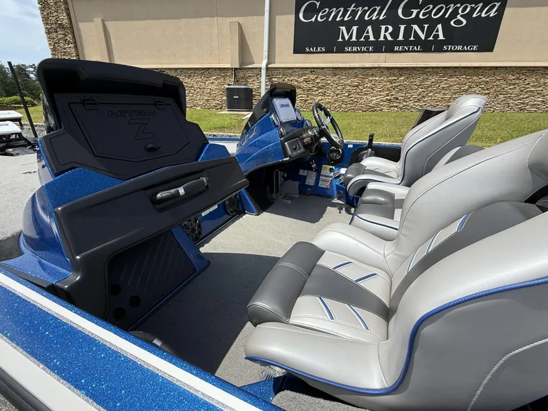 Slide: The Image of 2022 Nitro Z20 Pro boat interior at Central Georgia Marina, featuring sleek seating and dashboard. - 7
