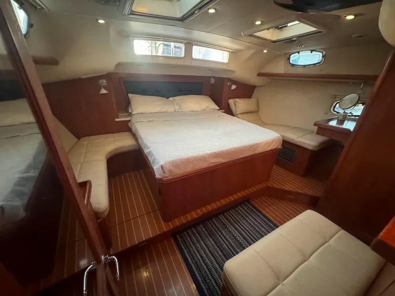 Slide: The Image of Luxurious interior of 2009 Hunter 50 Center Cockpit yacht with cozy bed and seating. - 17