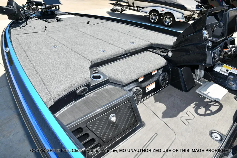 Slide: The Image of 2024 Nitro Z21 XL Pro Pack boat interior with spacious deck and advanced controls. - 12