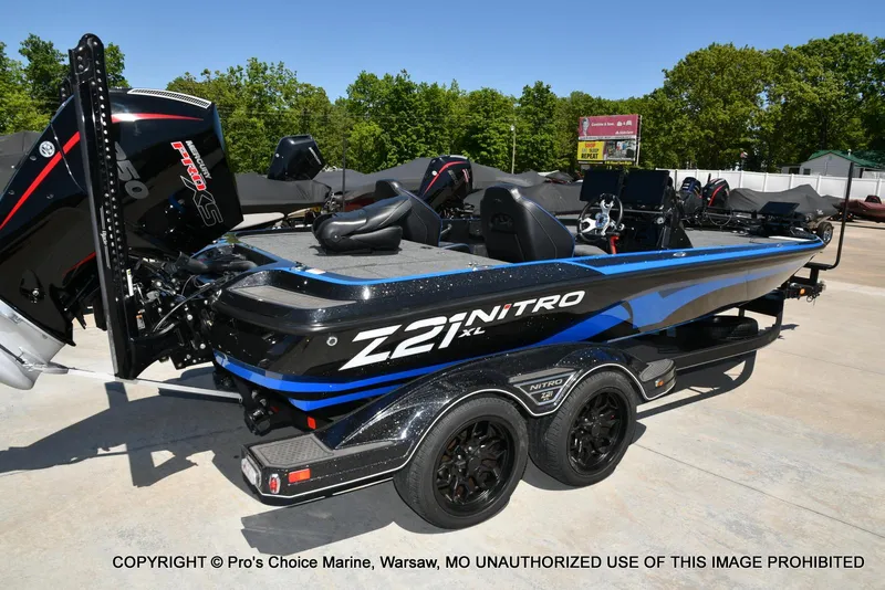 Slide: The Image of 2024 Nitro Z21 XL Pro Pack boat with sleek design and powerful engine. - 17