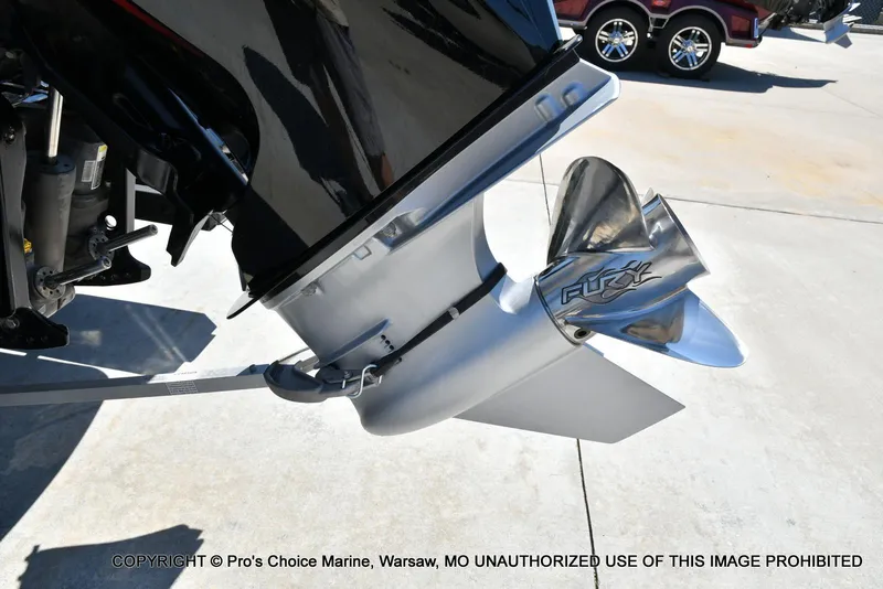 Slide: The Image of 2024 Nitro Z21 XL Pro Pack boat propeller detail in a showroom setting. - 21