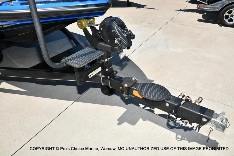 Slide: The Image of Trailer hitch of 2024 Nitro Z21 XL Pro Pack boat on concrete surface. - 30