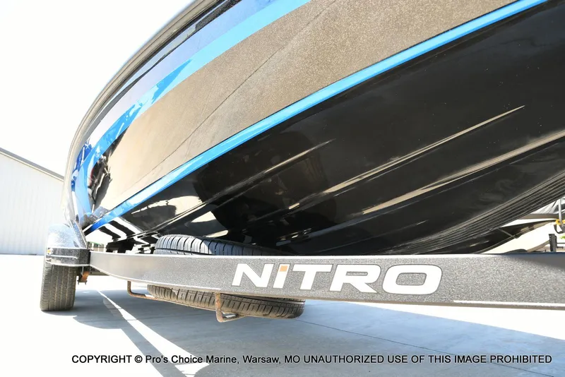 Slide: The Image of 2024 Nitro Z21 XL Pro Pack boat on trailer, close-up view. - 31