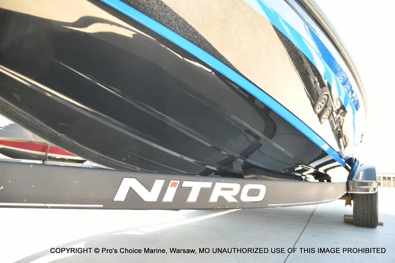 Slide: The Image of 2024 Nitro Z21 XL Pro Pack boat on trailer, close-up view. - 32
