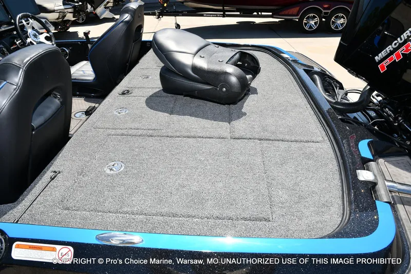 Slide: The Image of 2024 Nitro Z21 XL Pro Pack boat interior with seating and carpeted deck. - 38