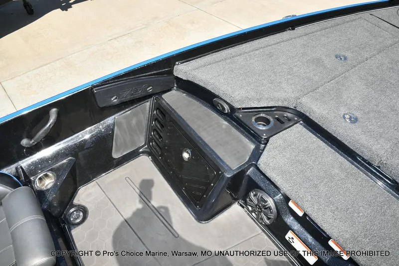 Slide: The Image of 2024 Nitro Z21 XL Pro Pack boat interior with storage and seating. - 43