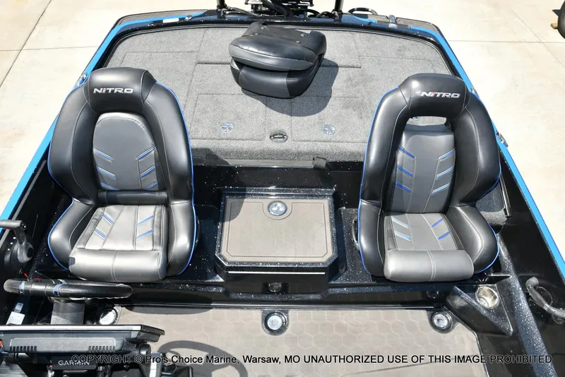 Slide: The Image of 2024 Nitro Z21 XL Pro Pack boat interior with two black and gray seats. - 46