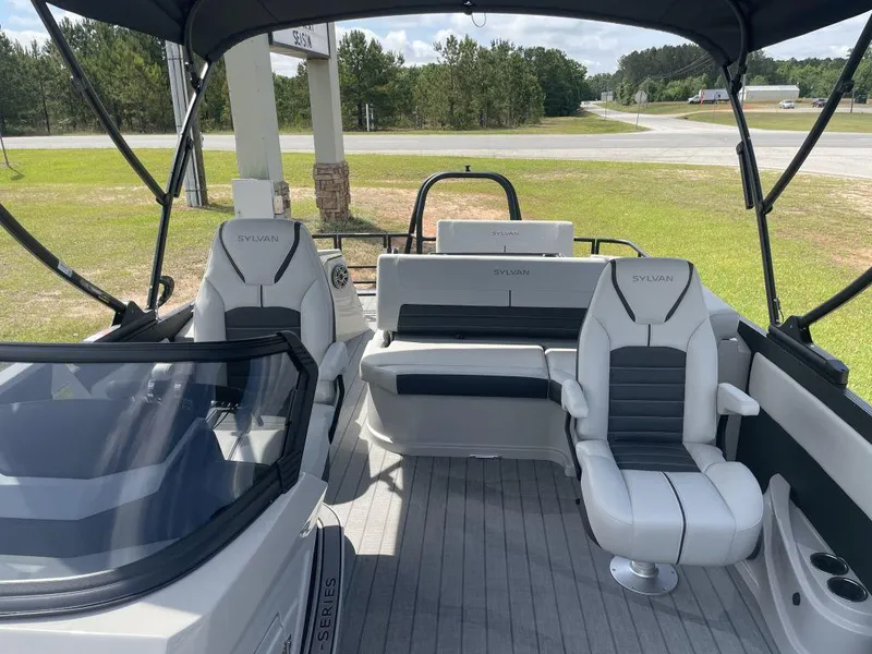 Slide: The Image of 2025 Sylvan G-3 DLZ DH boat interior with modern seating and sleek design. - 11