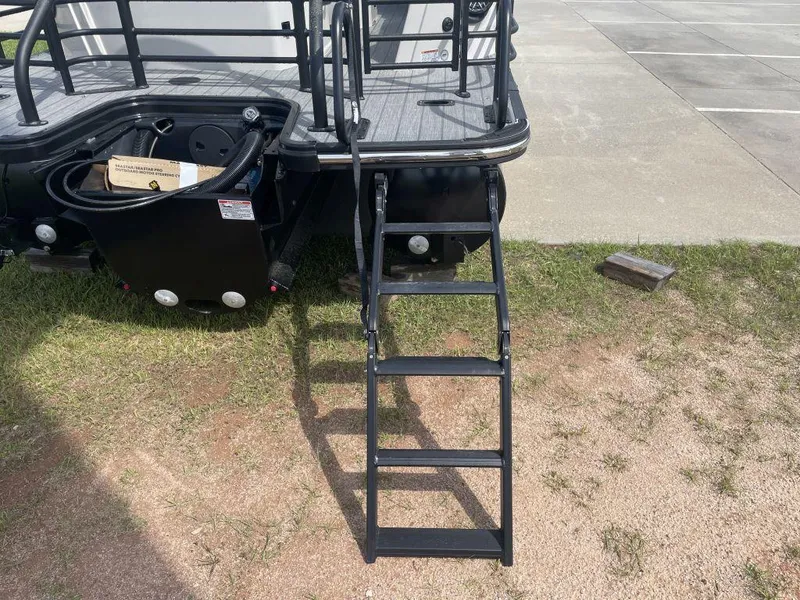 Slide: The Image of Rear view of 2025 Sylvan G-3 DLZ DH boat with ladder and deck. - 5