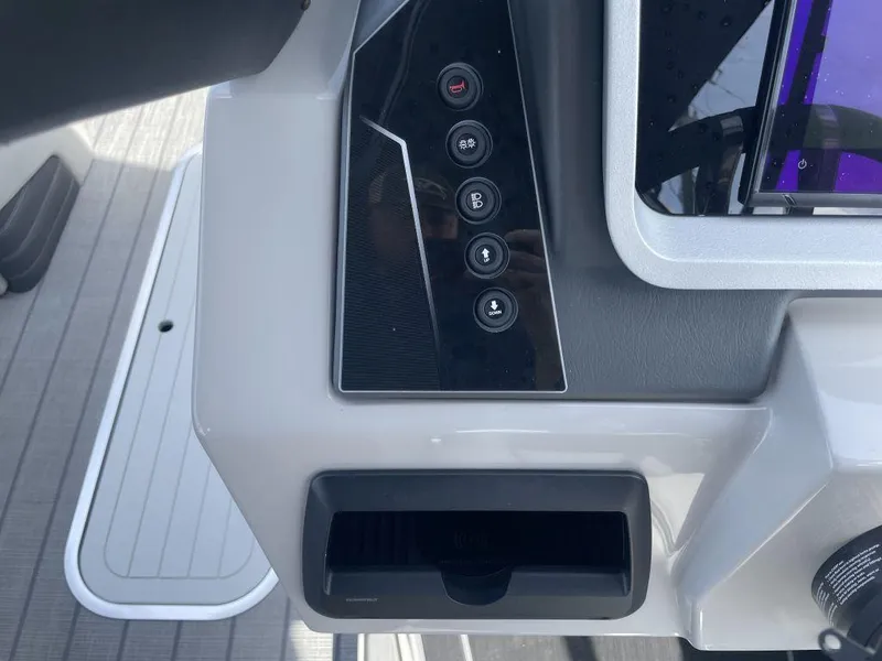 Slide: The Image of Control panel of 2025 Sylvan G-3 DLZ DH boat with buttons and display. - 7