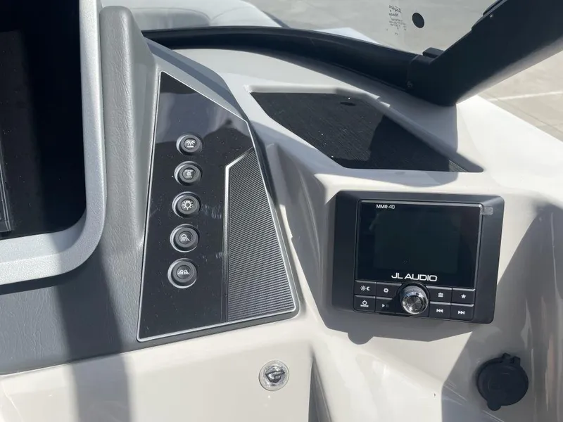 Slide: The Image of Control panel of 2025 Sylvan G-3 DLZ DH boat with JL Audio system. - 9