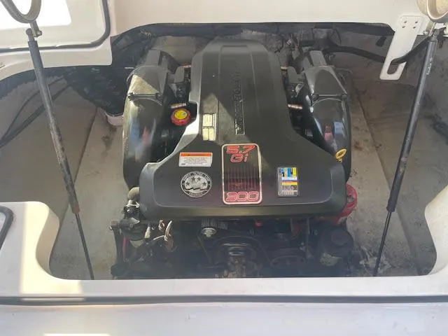 Slide: The Image of Engine compartment of a 2011 Cobalt 222 boat, featuring a powerful engine. - 3