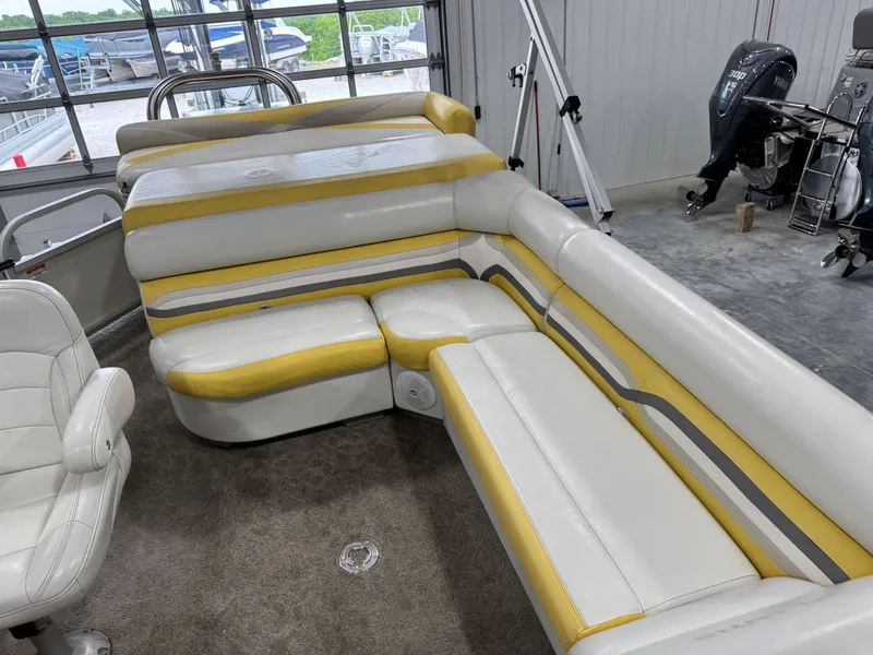 Slide: The Image of Interior of 2010 Landau 250 ATLANTIS boat with white and yellow seating. - 10