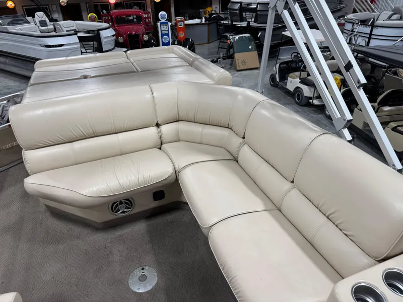 Slide: The Image of Luxurious beige seating on 2009 G3 25 ELITE pontoon boat, showroom display. - 12