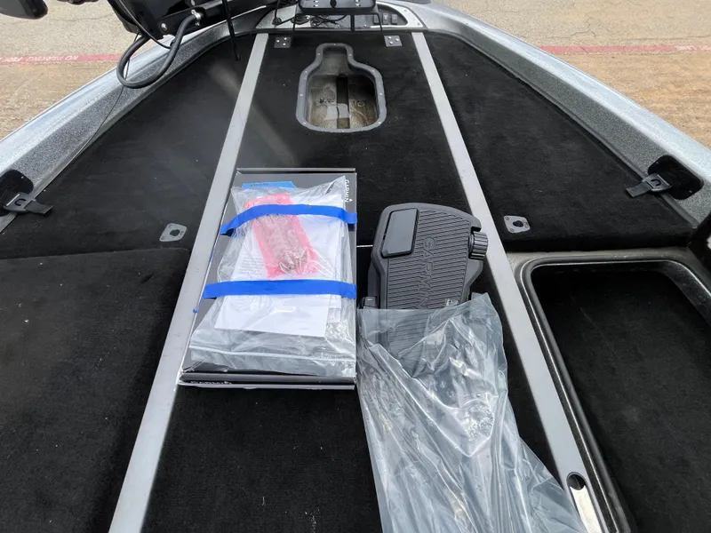 Slide: The Image of 2007 Ranger COMANCHE SERIES Z22 NASCAR boat interior with equipment and storage compartments. - 16