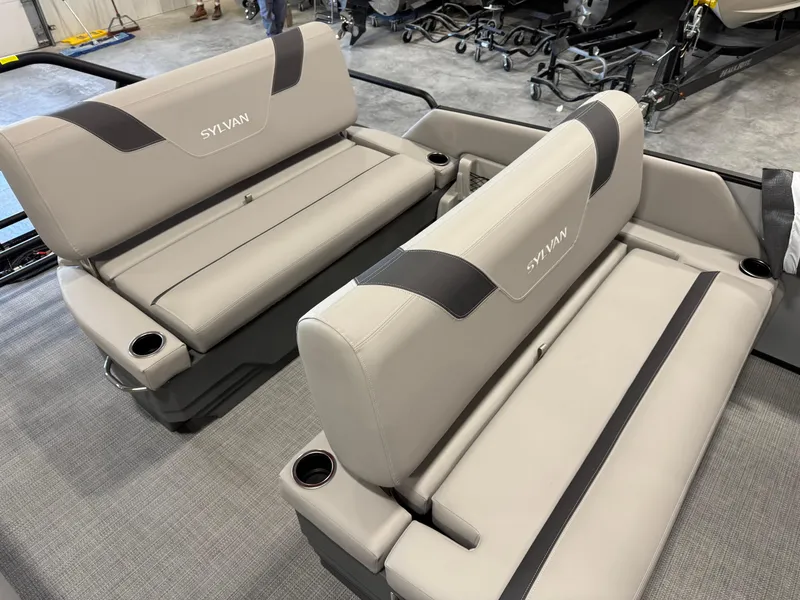 Slide: The Image of 2025 Sylvan L 5 boat interior with gray seating and cup holders. - 11
