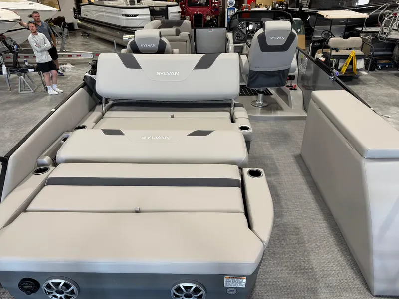 Slide: The Image of 2025 Sylvan L 5 pontoon boat interior with plush seating and modern design. - 14