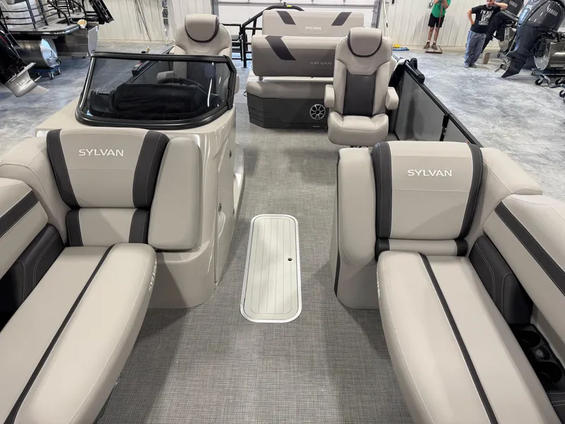 Slide: The Image of 2025 Sylvan L 5 boat interior with beige seating and modern design. - 9