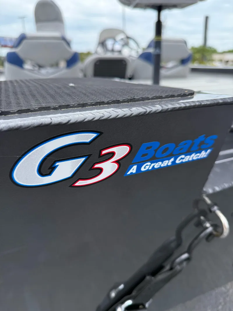 Slide: The Image of 2021 G3 Sportsman 1710 boat with logo and seating in background. - 11