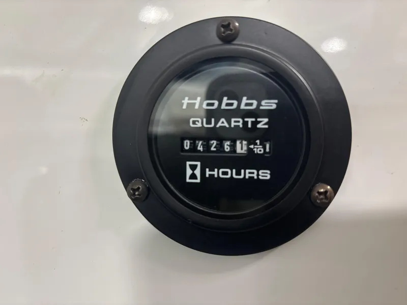 Slide: The Image of Hobbs Quartz hour meter displaying 426.1 hours on a 2008 Cobalt 202. - 19