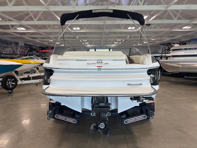 Slide: The Image of 2008 Cobalt 202 boat in showroom, rear view with propeller and swim platform. - 5