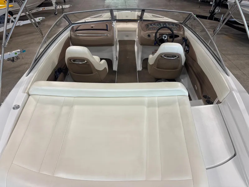 Slide: The Image of Interior of a 2008 Cobalt 202 boat with white and brown seating. - 7