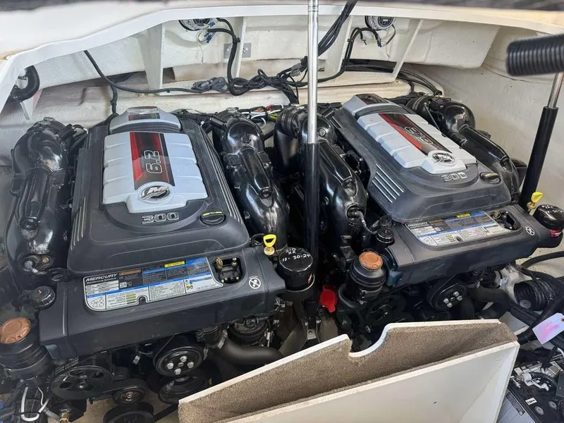 Slide: The Image of Twin Mercury 6.2L engines in a 2023 Sea Ray SLX 310 boat. - 11