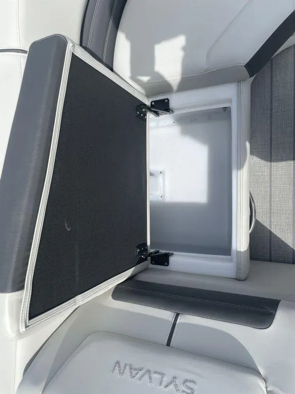 Slide: The Image of Open storage compartment in 2025 Sylvan G-3 DLZ DH boat seat. - 18