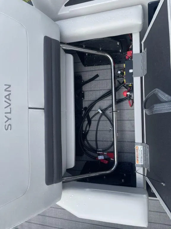 Slide: The Image of Sylvan G-3 DLZ DH 2025 boat interior with seat and wiring components. - 24