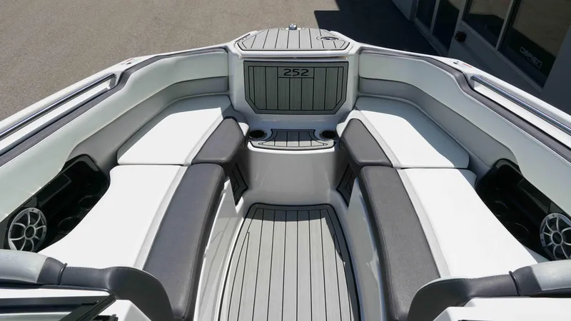 Slide: The Image of 2021 Yamaha Boats 252SD interior with sleek seating and modern design. - 10