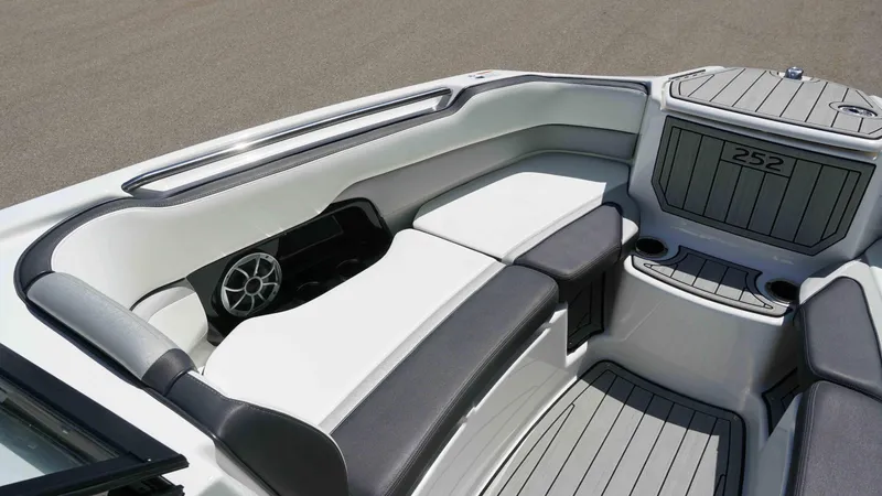 Slide: The Image of 2021 Yamaha Boats 252SD interior with sleek seating and modern design. - 11