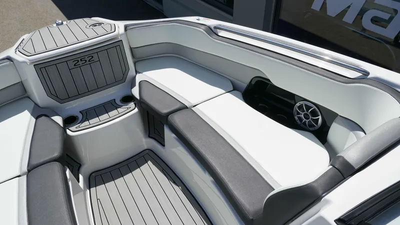 Slide: The Image of 2021 Yamaha Boats 252SD interior with sleek seating and modern design features. - 12
